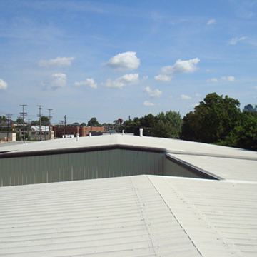 another Metal Roof Restored by Morris and Sons Roofing